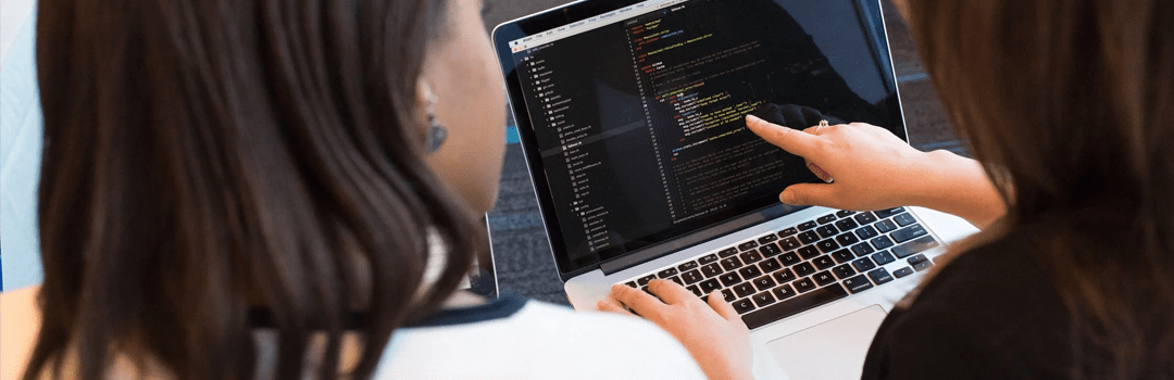 software developer two girls laptop codes